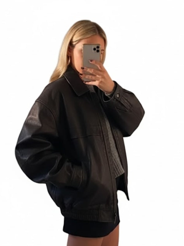 Person wearing a black jacket with a white background