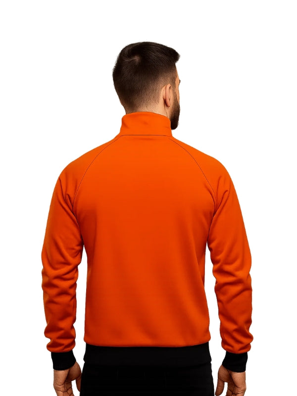 Person wearing an orange jacket on a white background