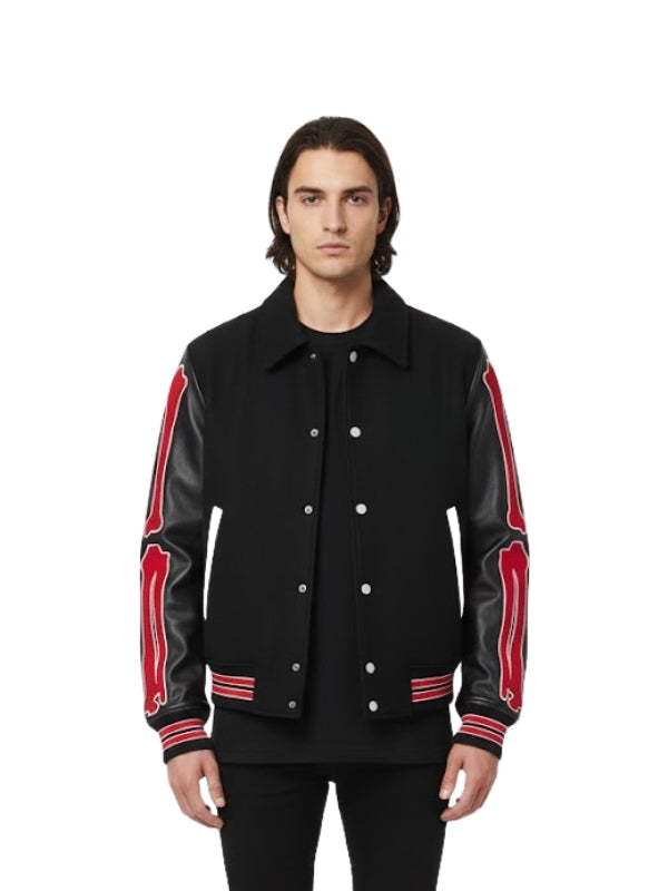 Man wearing a black jacket with red accents on a white background