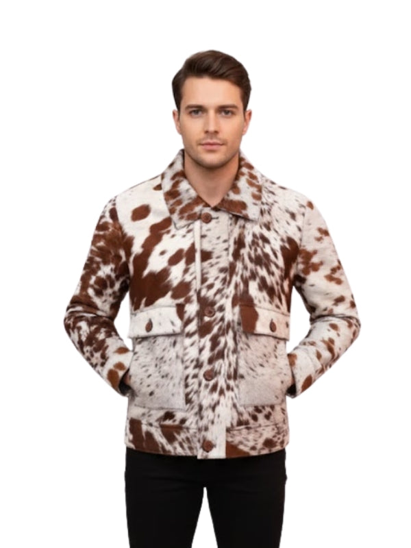 Man wearing a brown and white cow print jacket on a white background