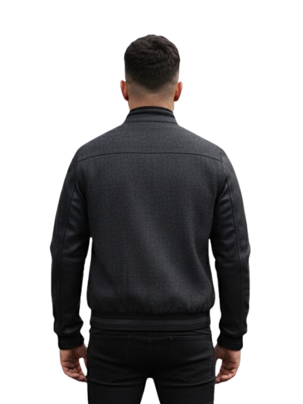 Man wearing a dark gray jacket on a white background