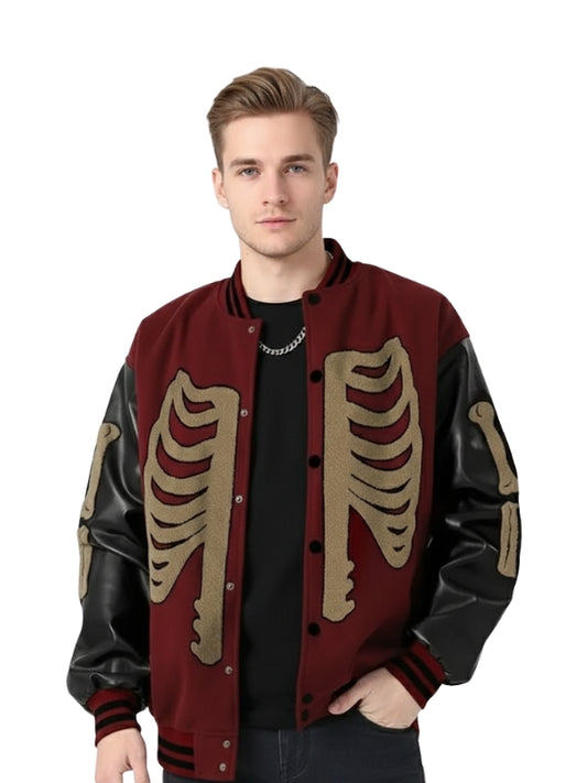 Man wearing a red and black jacket with skeleton designs on a white background
