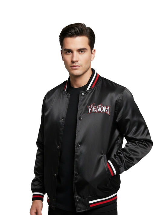 Man wearing a black 'Venom' jacket on a white background