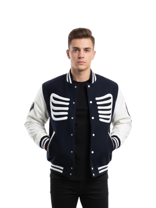 Man wearing a navy and white varsity jacket with skeleton design on a white background
