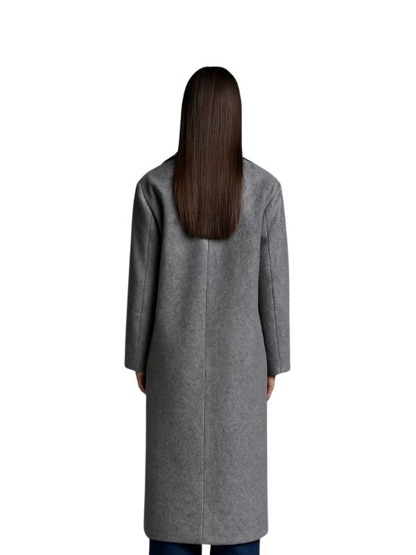 Person wearing a gray coat from behind on a white background