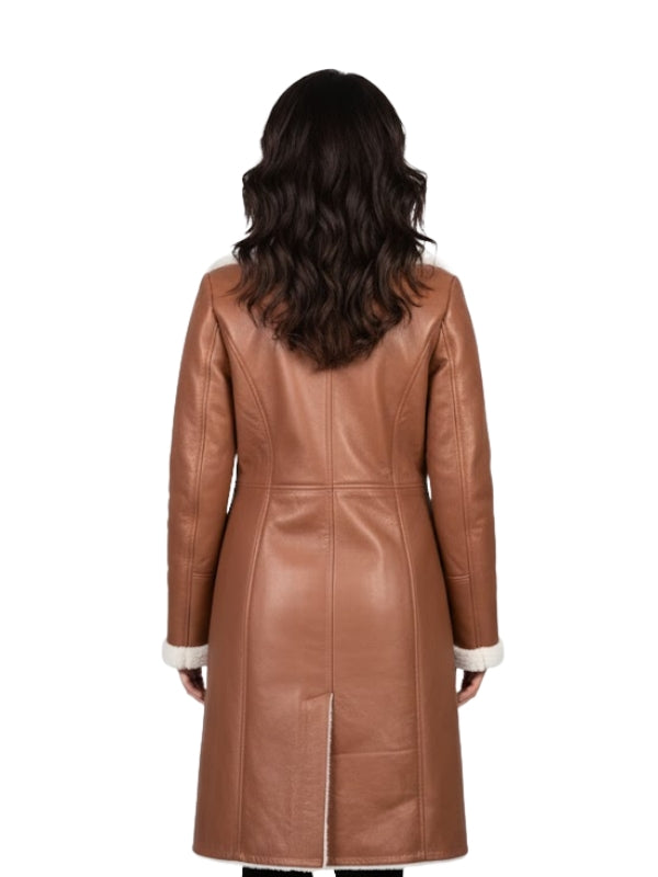 Brown leather coat worn by a person on a white background