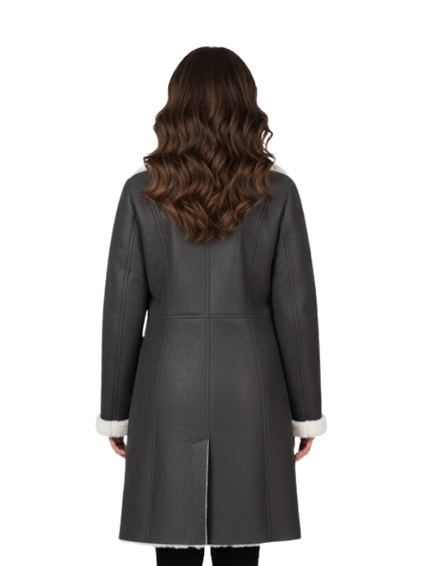 Woman wearing a gray coat with white trim on a white background