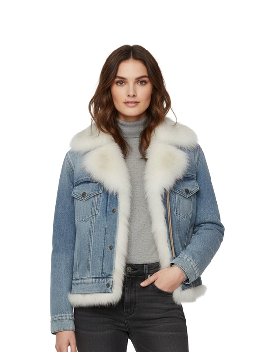 Woman wearing a denim jacket with white fur trim on a white background