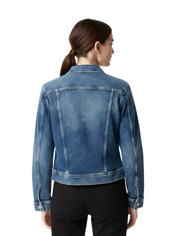 Woman wearing a blue denim jacket on a white background