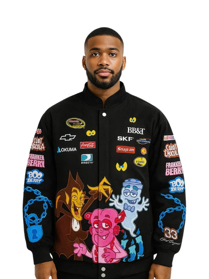 Man wearing a black jacket with colorful graphics and brand logos on a white background