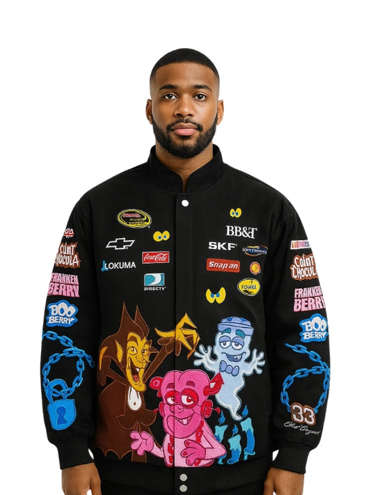 Man wearing a black jacket with colorful graphics and brand logos on a white background