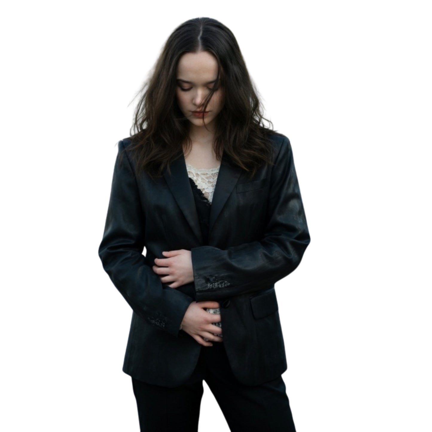 Woman wearing a black suit on a white background