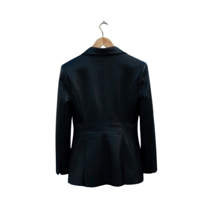 Black jacket on a hanger against a white background