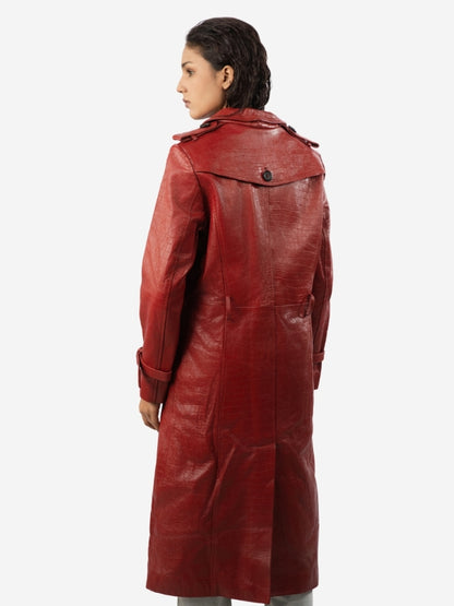 Woman wearing red leather trench coat