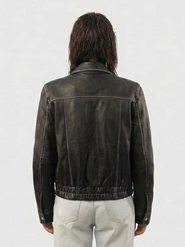 Person wearing a dark leather jacket from behind on a white background
