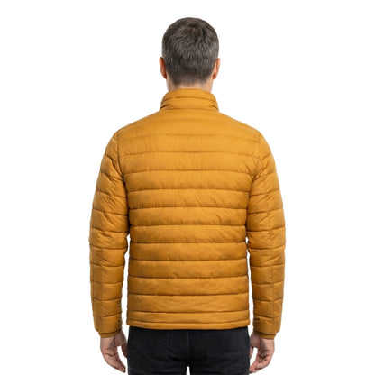Man wearing a mustard yellow puffer jacket on a white background