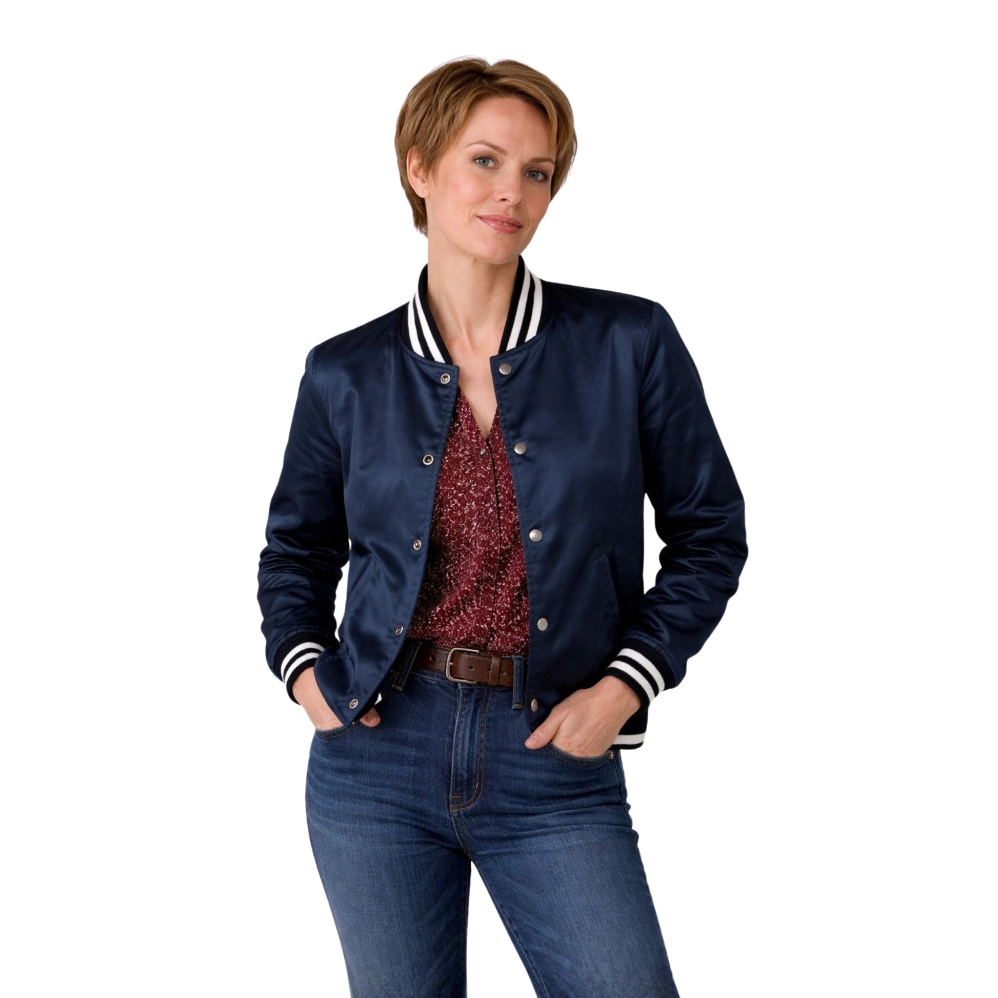Woman wearing a navy blue jacket with white trim, red patterned shirt, and blue jeans on a white background