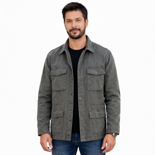 Man wearing a gray jacket on a white background