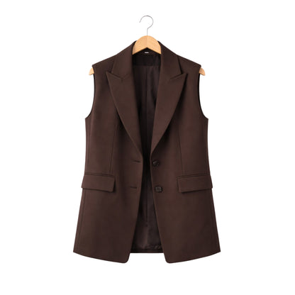Brown vest on a hanger against a white background