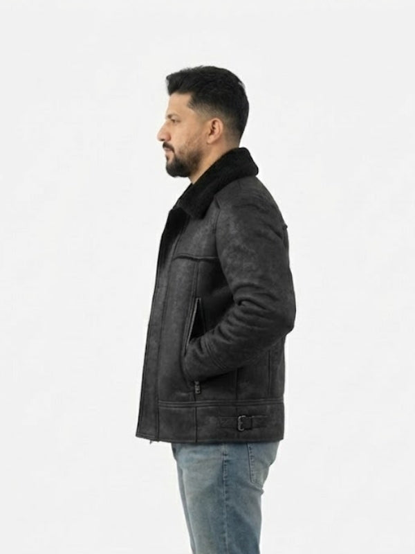 Man wearing a dark leather jacket with fur collar on a white background