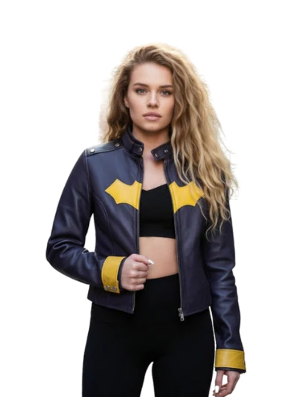 Woman wearing a blue leather jacket with yellow accents on a white background