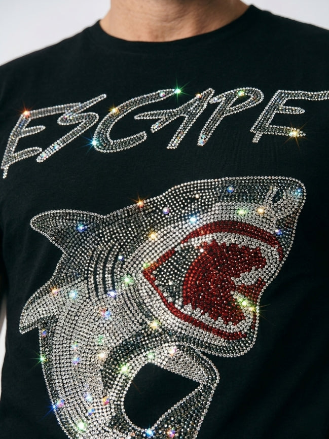 Black shirt with a shark graphic and 'ESCAPE' text made of rhinestones.