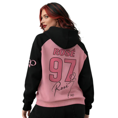 Person wearing a black and pink hoodie with 'ROSE 97' text on the back.