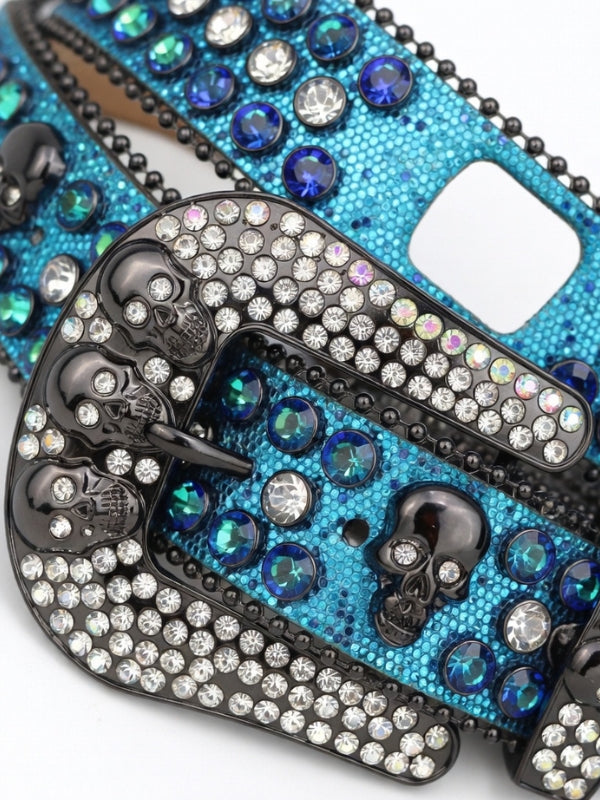 Phone case with skull design and blue gemstones on a white background