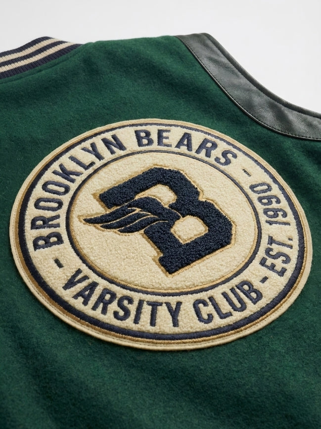 Green jacket with 'Brooklyn Bears Varsity Club' patch on a white background