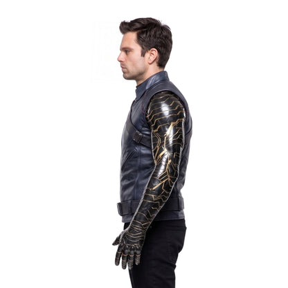 Person wearing a black leather jacket with gold accents on a white background