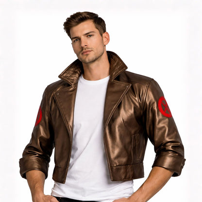 Man wearing a brown leather jacket with red patches on a white background
