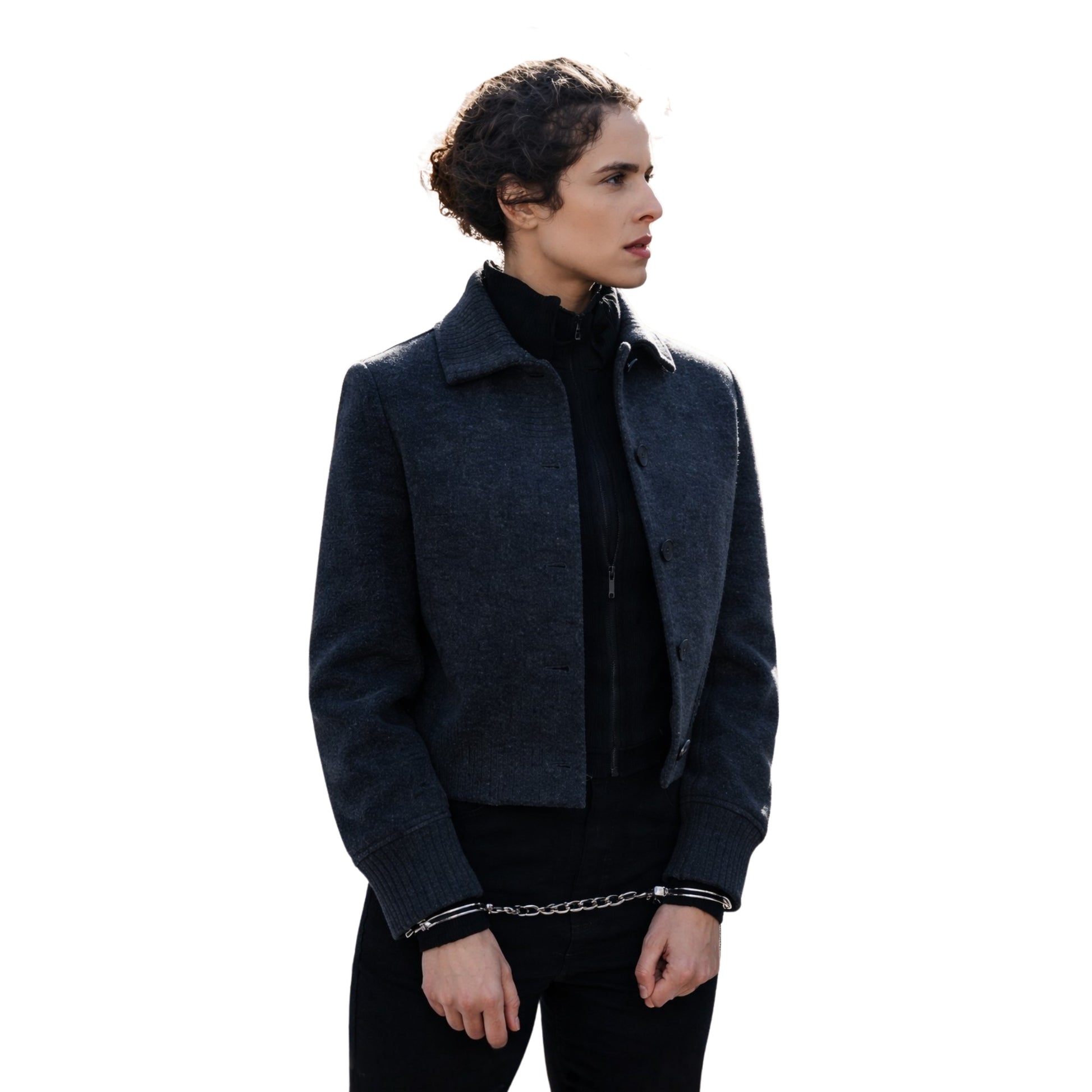 Person wearing a dark gray coat on a white background
