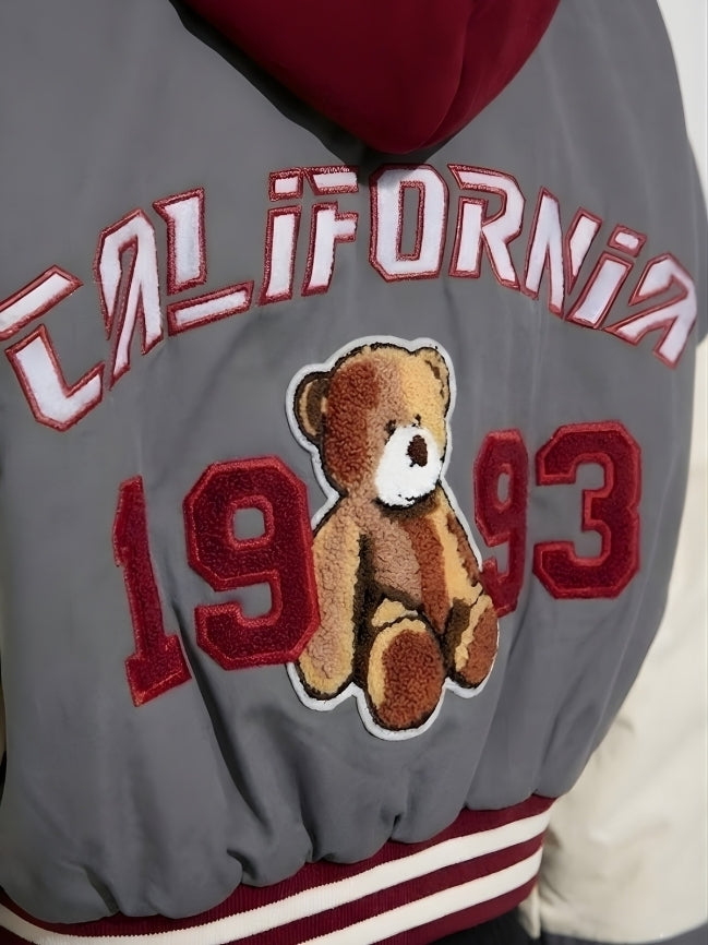 Gray jacket with teddy bear and 'California 1993' text on a plain background