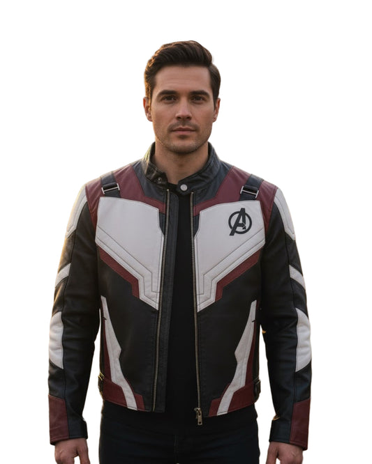 Man wearing a superhero jacket with a logo in a field during sunset