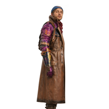 Person wearing a long brown leather coat with colorful accents on a white background