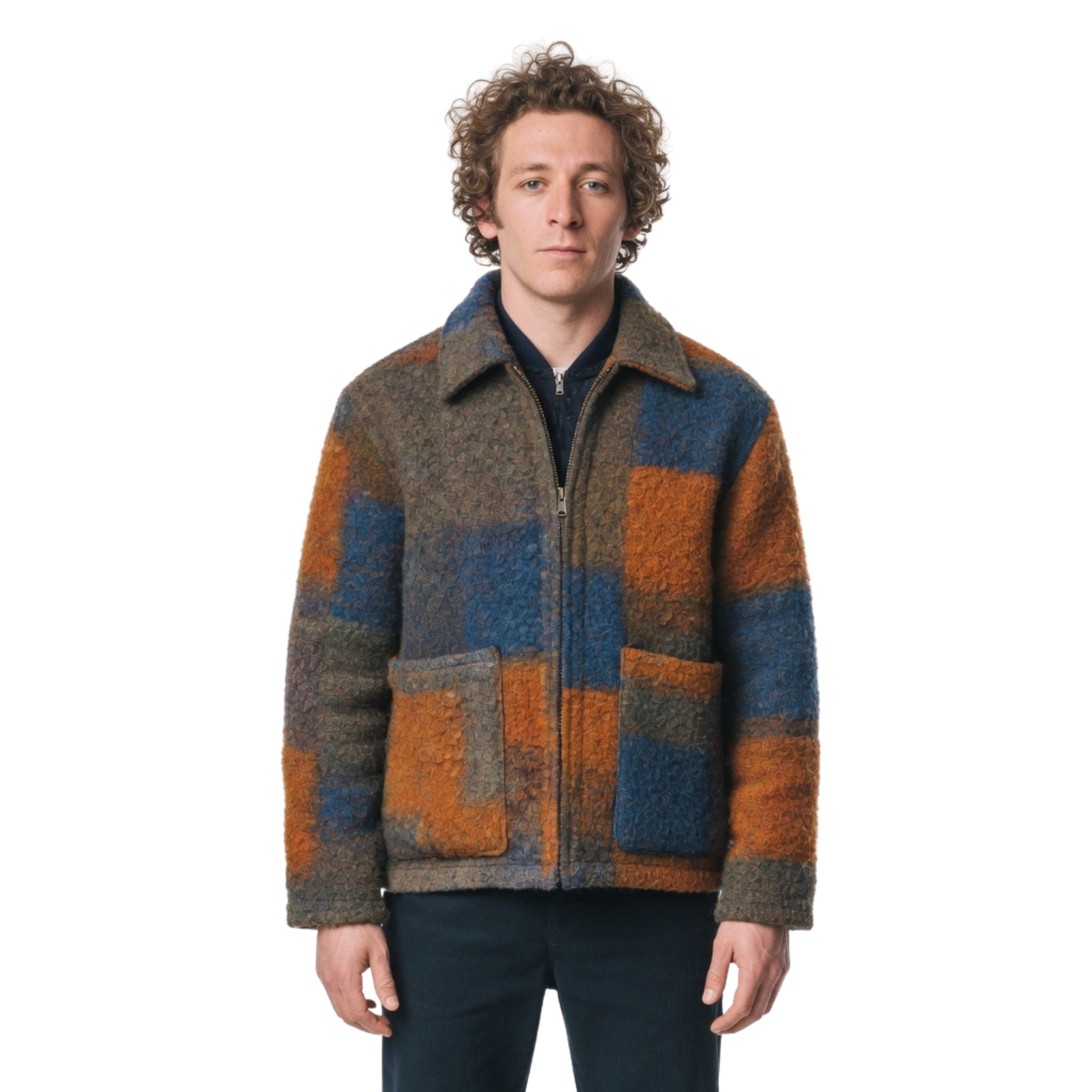 Man wearing a patterned jacket on a white background
