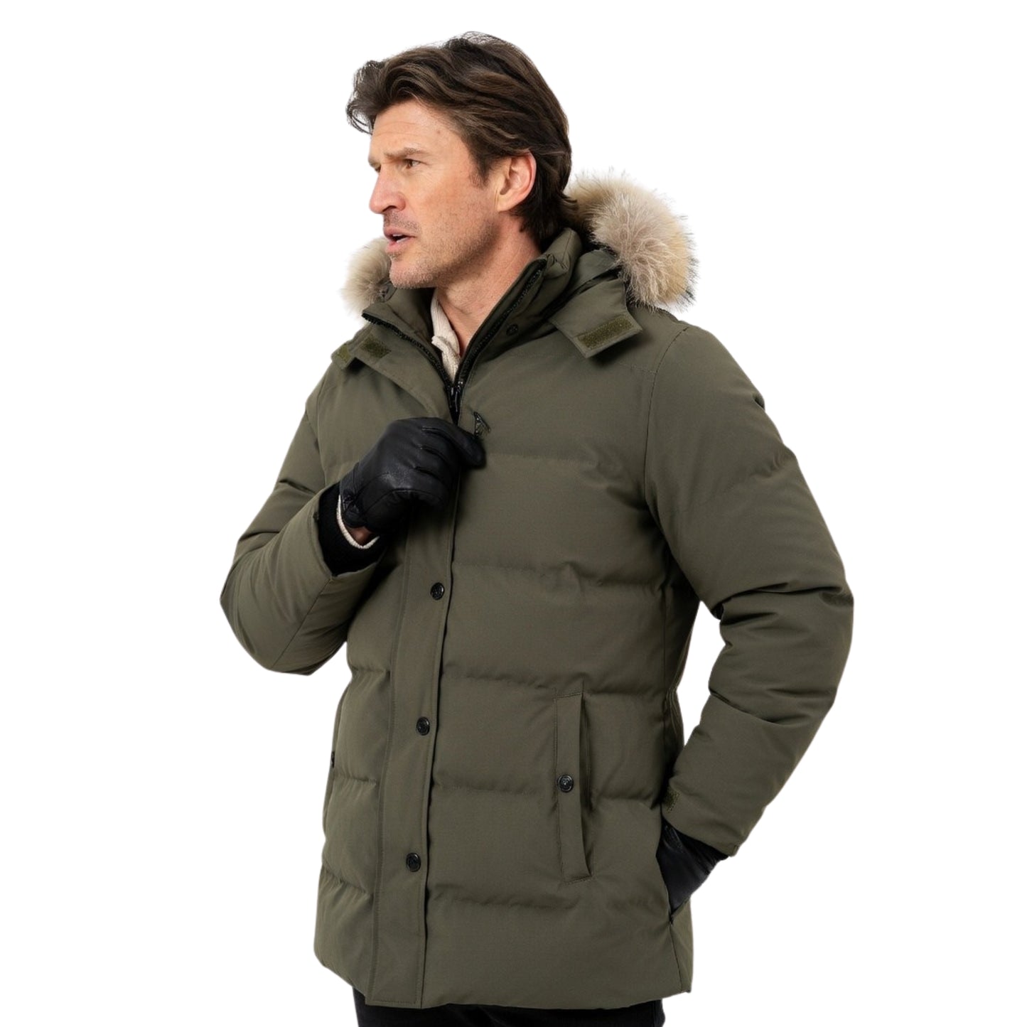 Man wearing a green winter coat with fur-lined hood on a white background