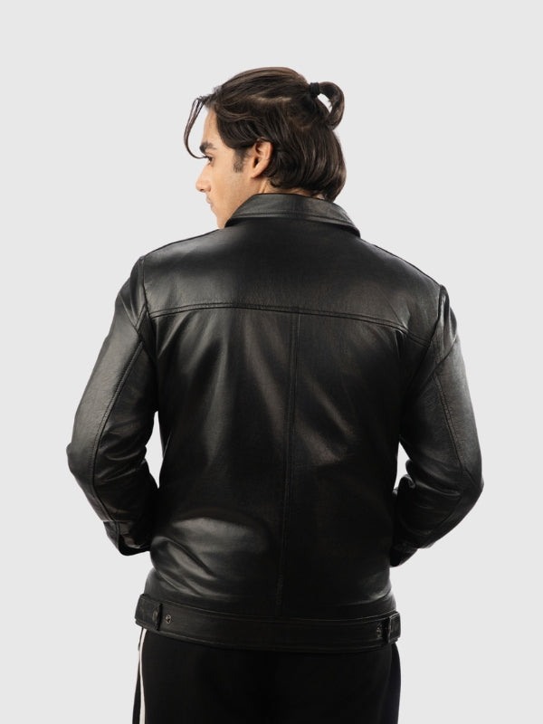 Person wearing a black leather jacket on a white background