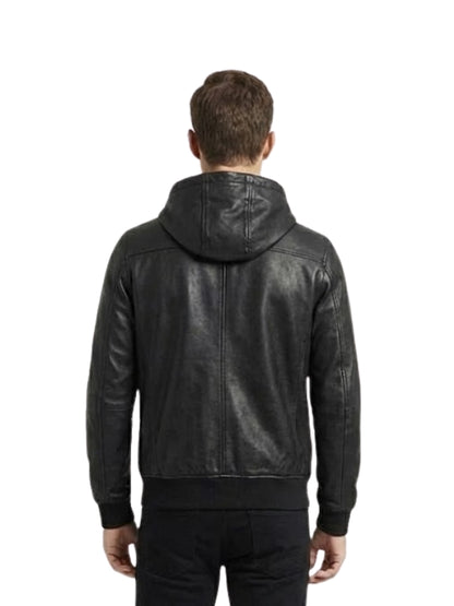 Man wearing a black leather jacket with a hood on a white background