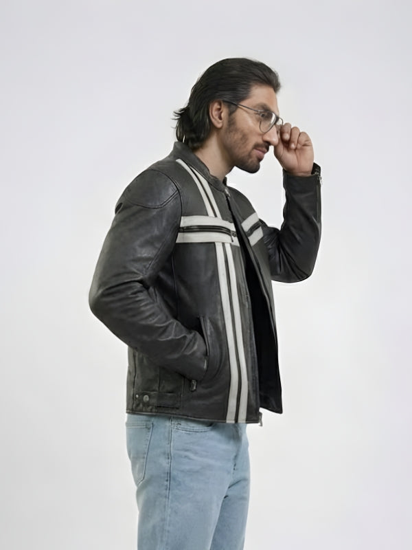 Man wearing a black leather jacket with white stripes on a white background