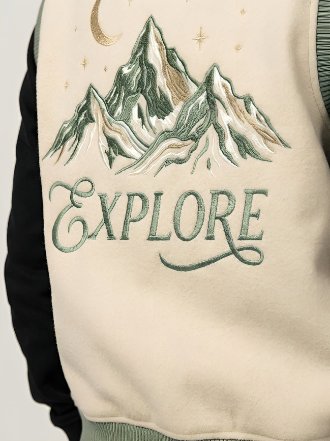 Jacket with embroidered mountain design and 'EXPLORE' text on a plain background
