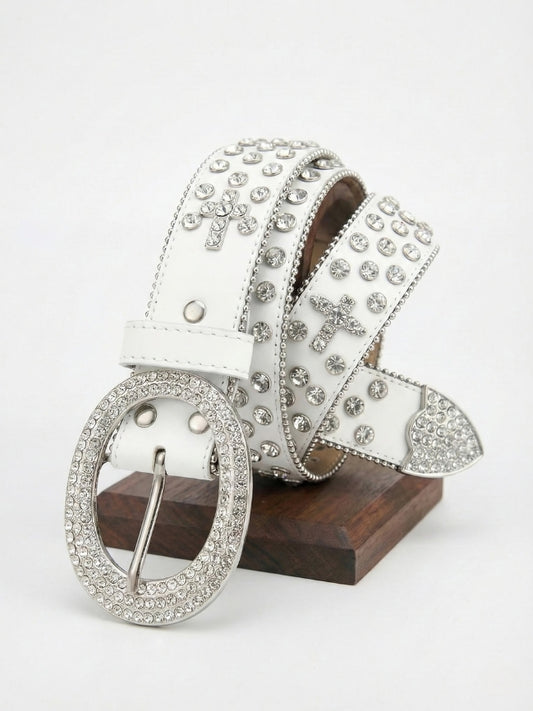 White belt with silver embellishments on a wooden block against a white background