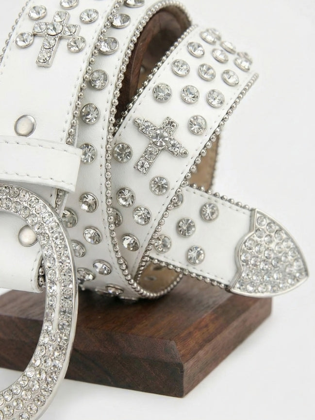 Decorative ribbon with crystals and crosses on a wooden block