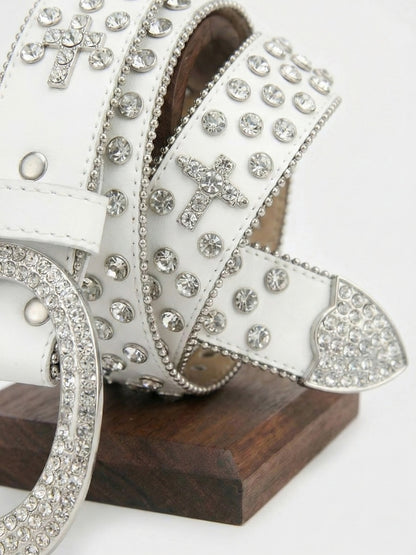 Decorative ribbon with crystals and crosses on a wooden block