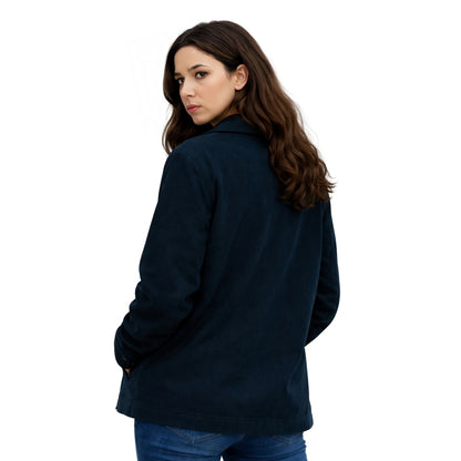Woman wearing a dark blue jacket on a white background