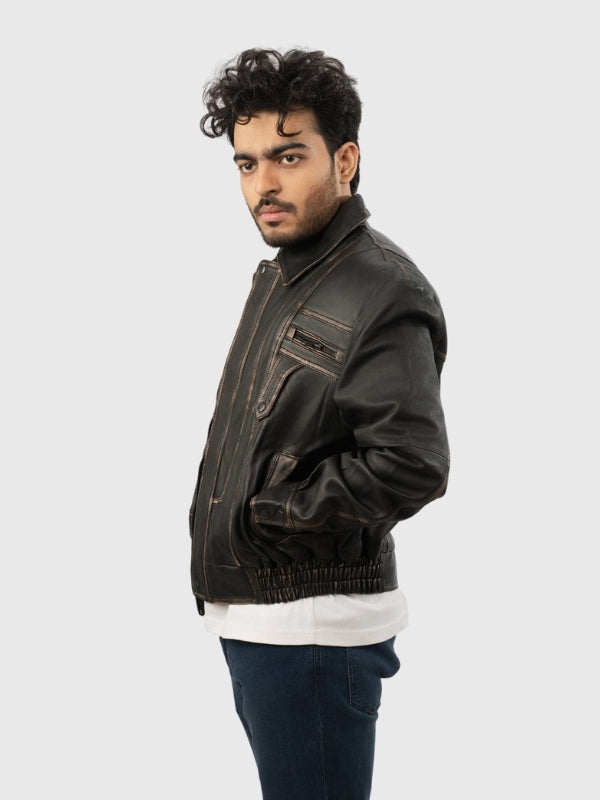 Man wearing a dark brown leather jacket on a white background