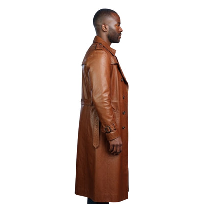 Man wearing a brown leather trench coat on a white background