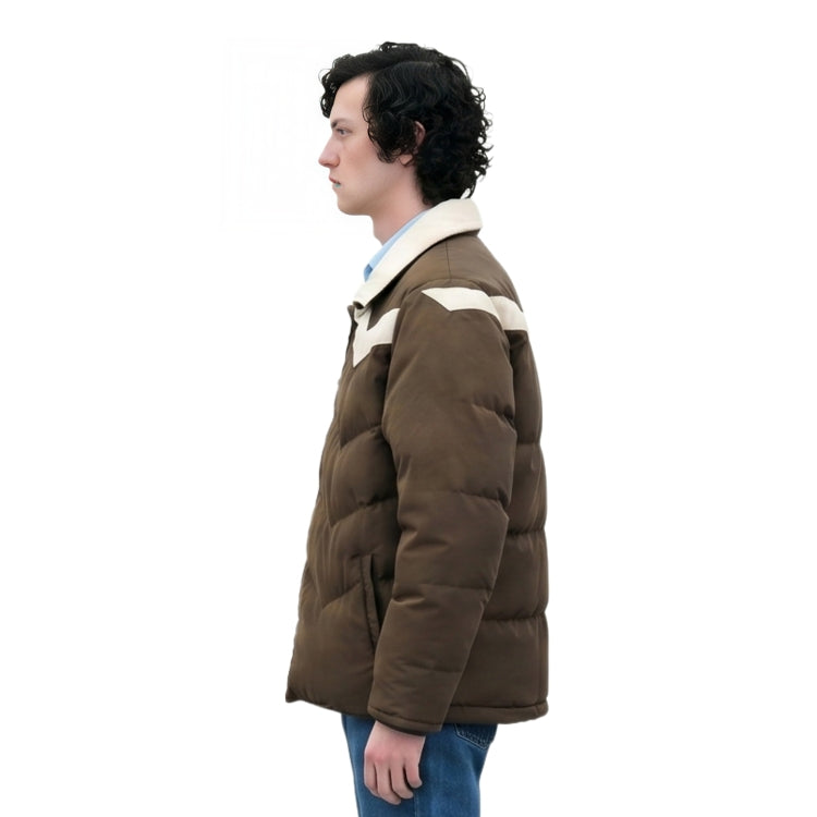 Person wearing a brown puffer jacket with white lining on a white background