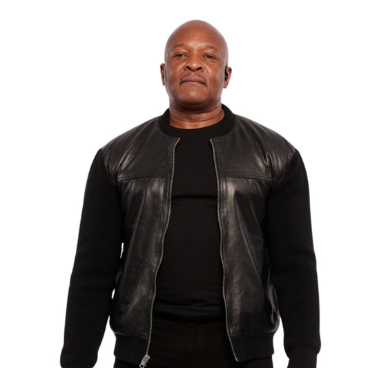 Man wearing a black leather jacket over a black shirt on a white background