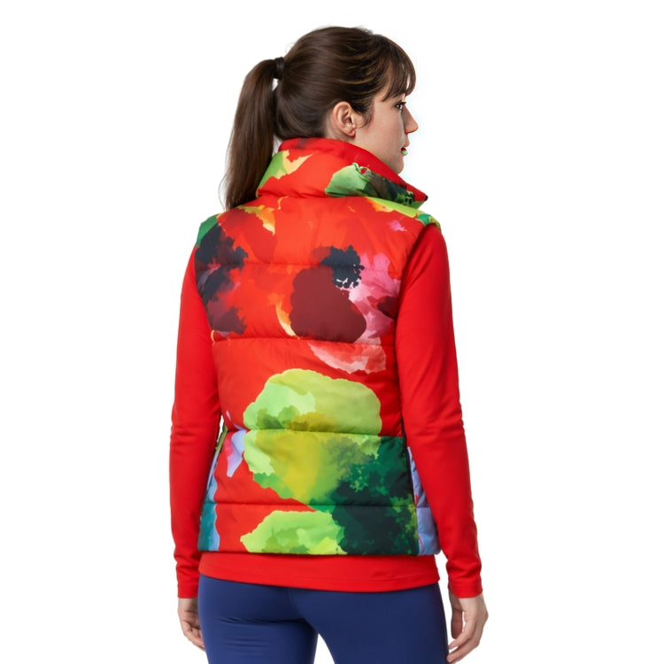 Woman wearing a colorful puffer vest with a white background